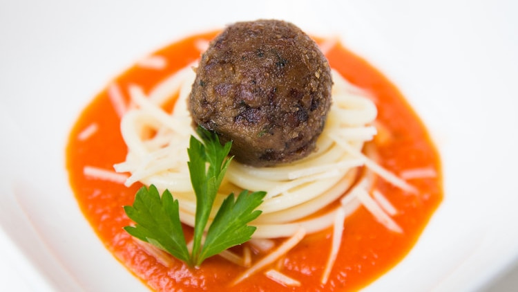 A meatball on spaghetti.