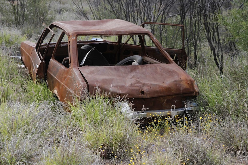 Abandoned rusted car
