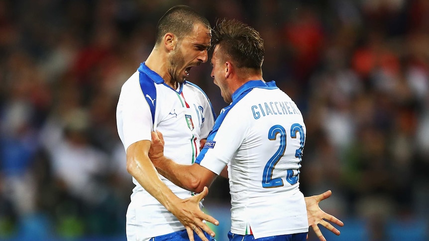 Emanuele Giaccherini and Leonardo Bonucci celebrate goal for Italy