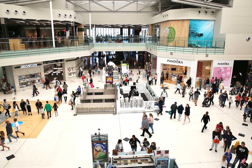 A wide shot of shops and shoppers in the Lakeside Joondalup shopping centre in Perth's north.