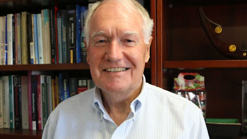 A head and shoulders shot of a smiling Professor Alan Bittles.