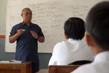 Seorang guru di sekolah rahasia Indonesia