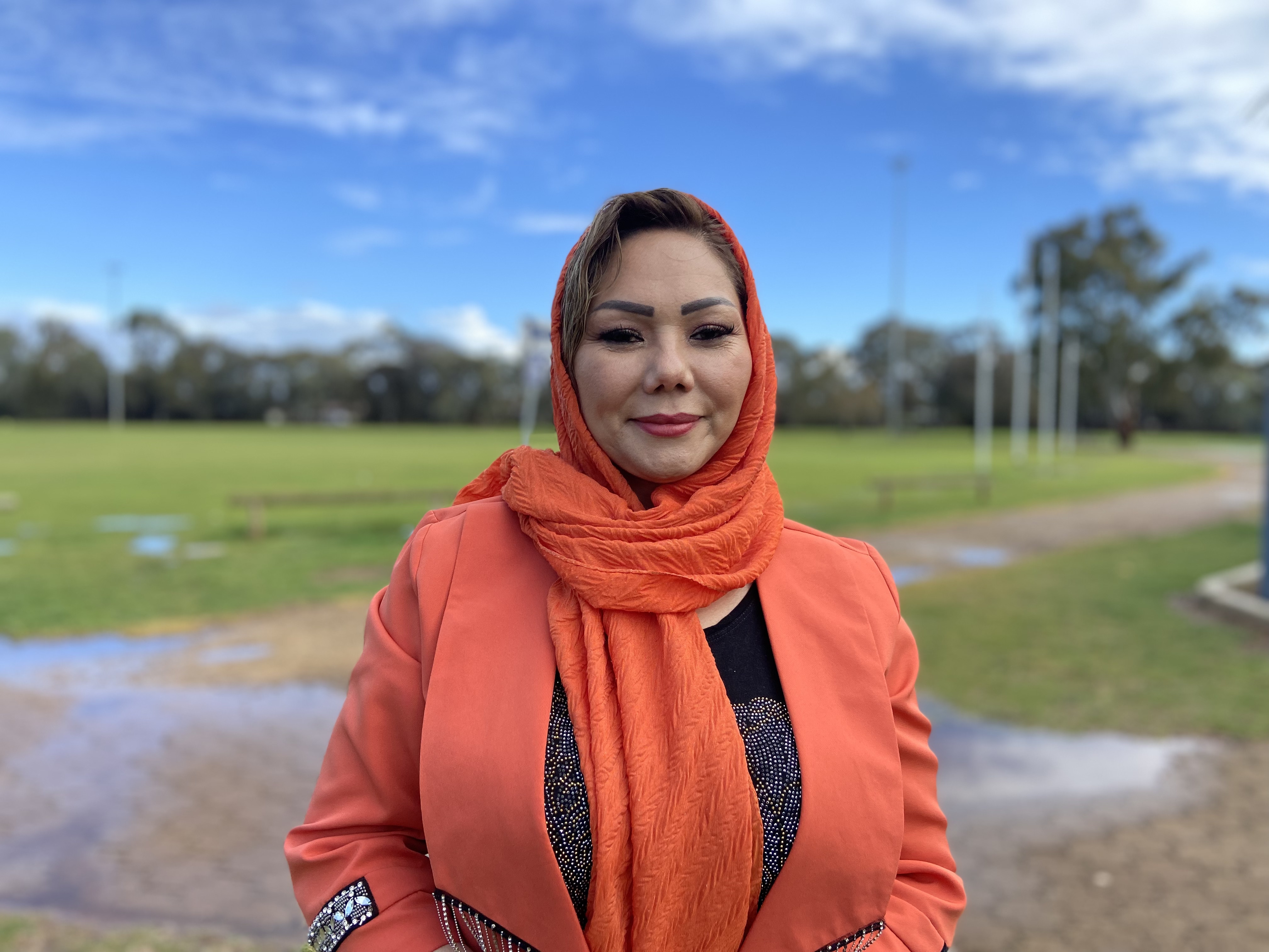 Masooma smiles at the camera. 