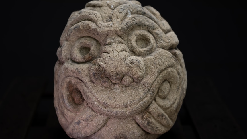 A large stone-carved head from Peru that dates back 2,500 years.