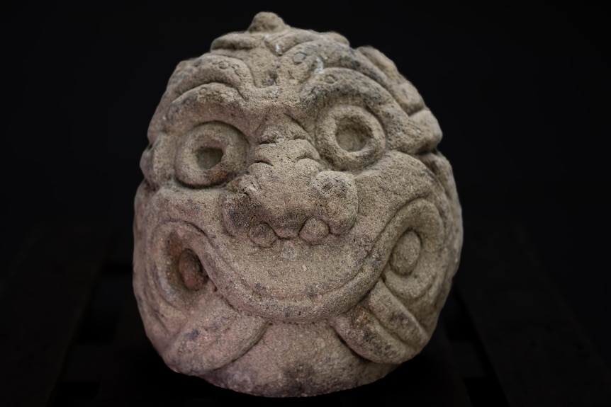 A large stone-carved head from Peru that dates back 2,500 years.