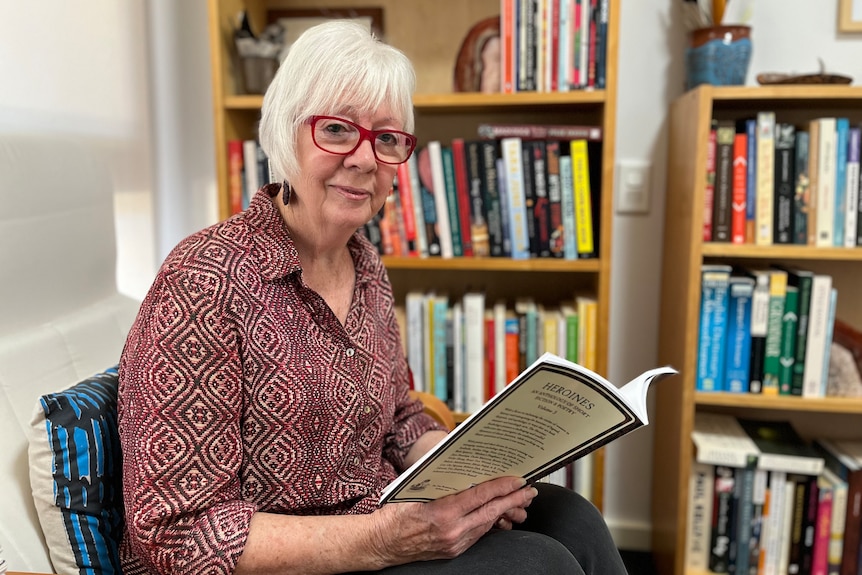 Judi Morrison sits in her writing room.