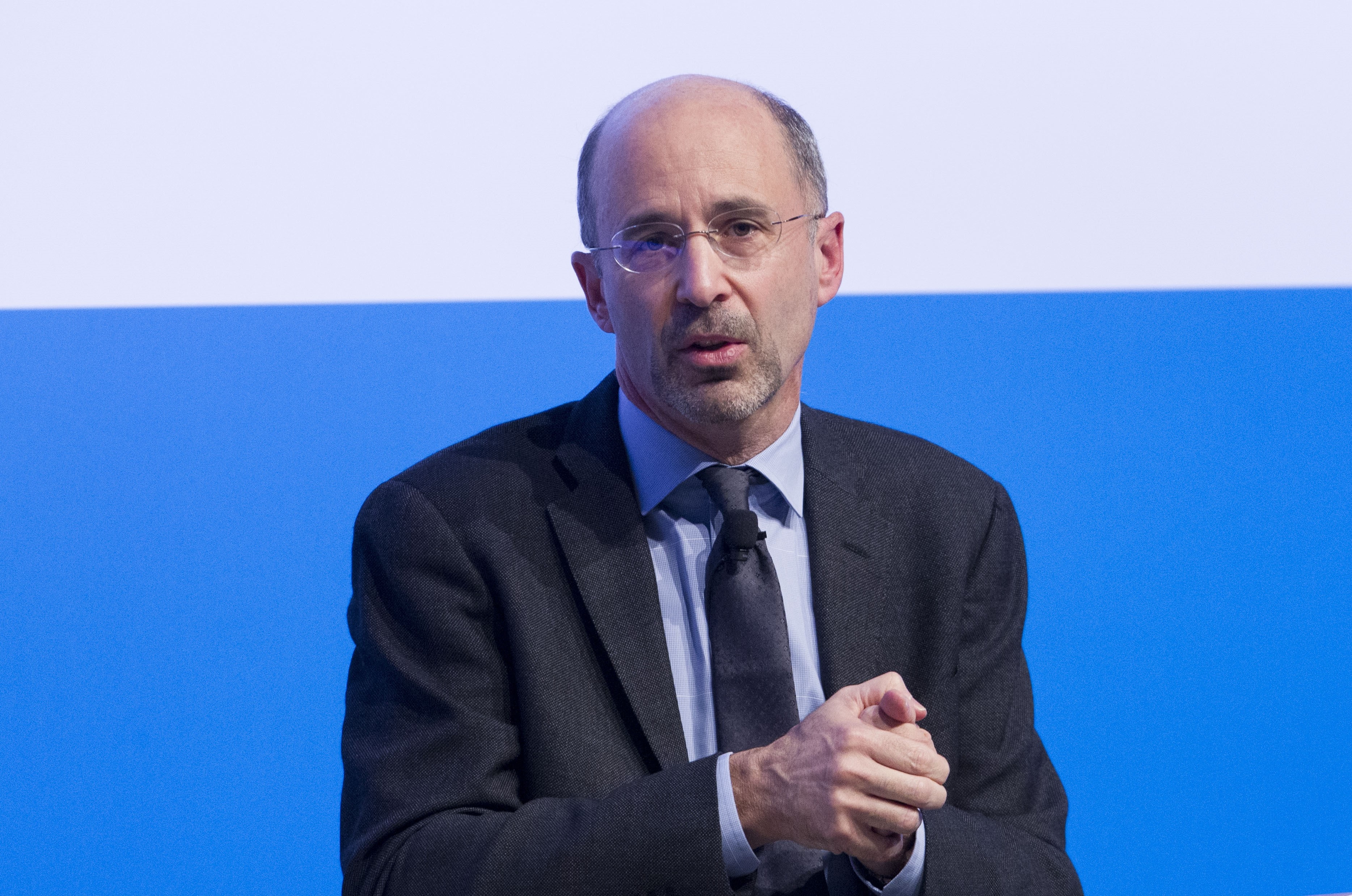 A man wearing a suit and tie.