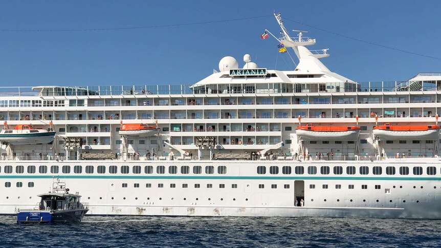 Cruise ship Artania with Police vessel Cygnet attempting evacuation
