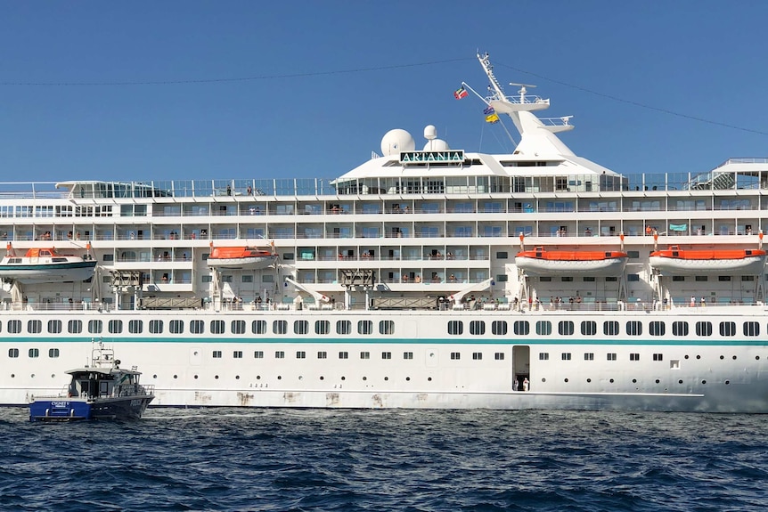 Cruise ship Artania with Police vessel Cygnet attempting evacuation