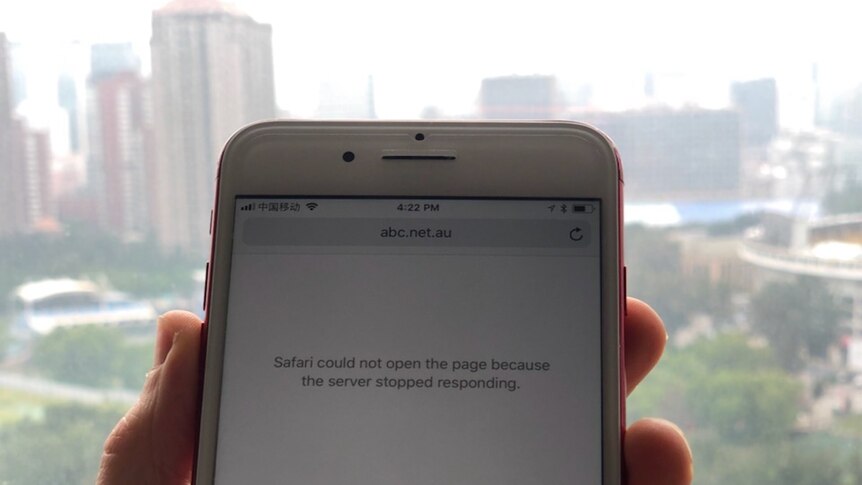 A phone with a screen saying 'Safari could not open the page because the server stopped responding'