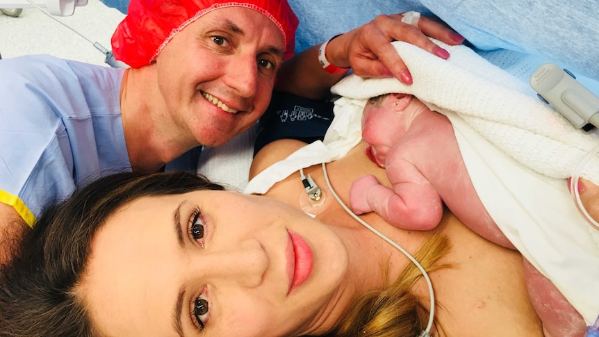 Kirsty Browne with her newborn son and husband Murray
