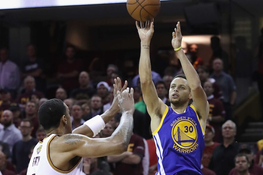 Steph Curry shoots in game four of the NBA Finals