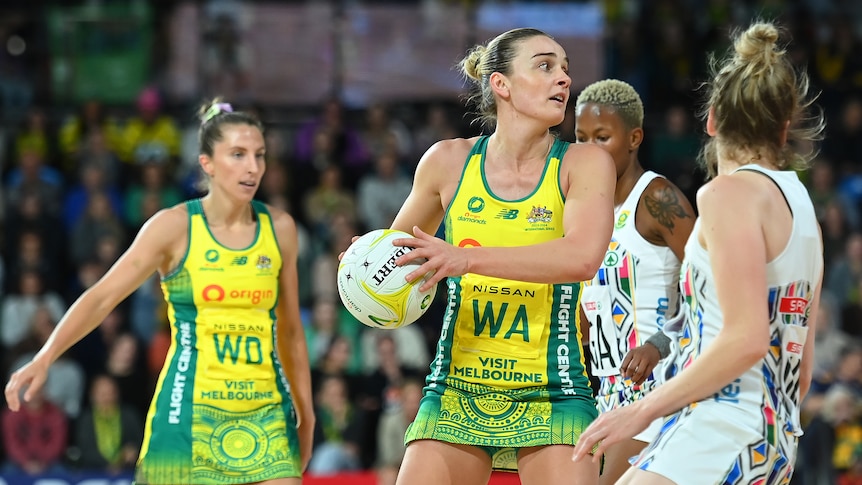 Liz Watson with the ball for Australia's Diamonds during a netball Test against South Africa.