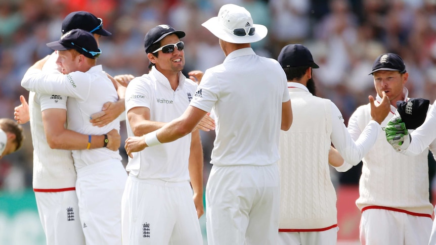 Convincing win ... Alastair Cook (c) and England celebrate after winning the Ashes