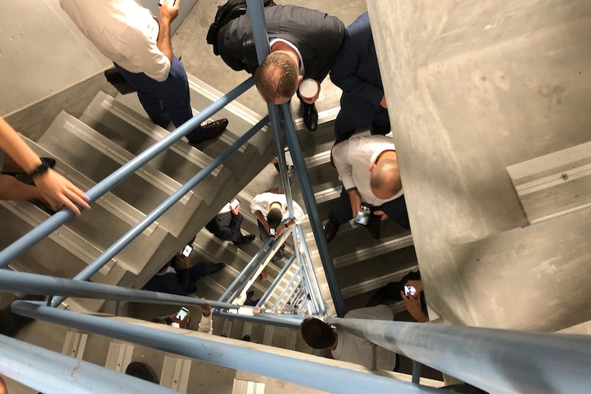 A large staircase with people on it.