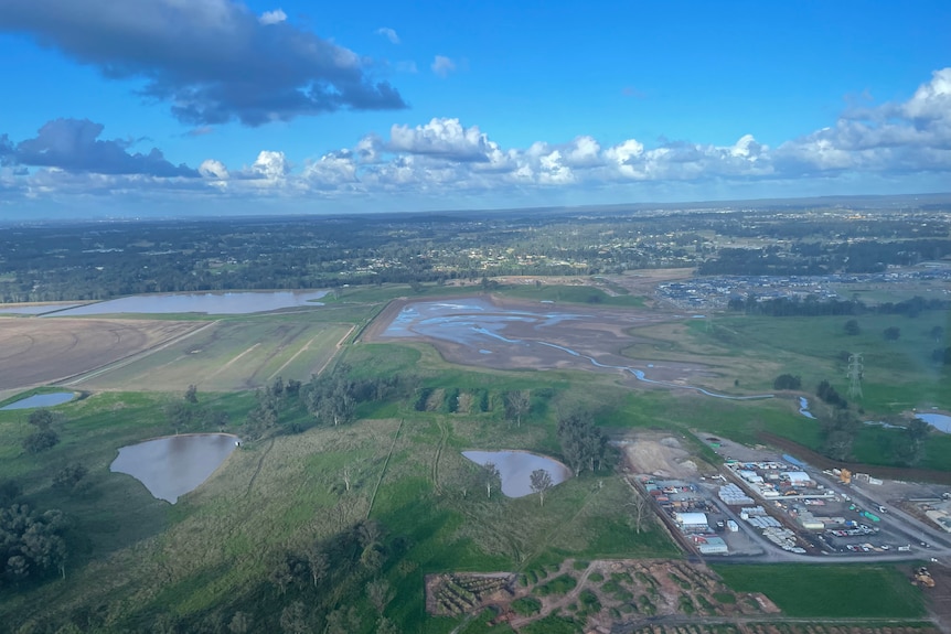 An aerial photo of dams on a farm.