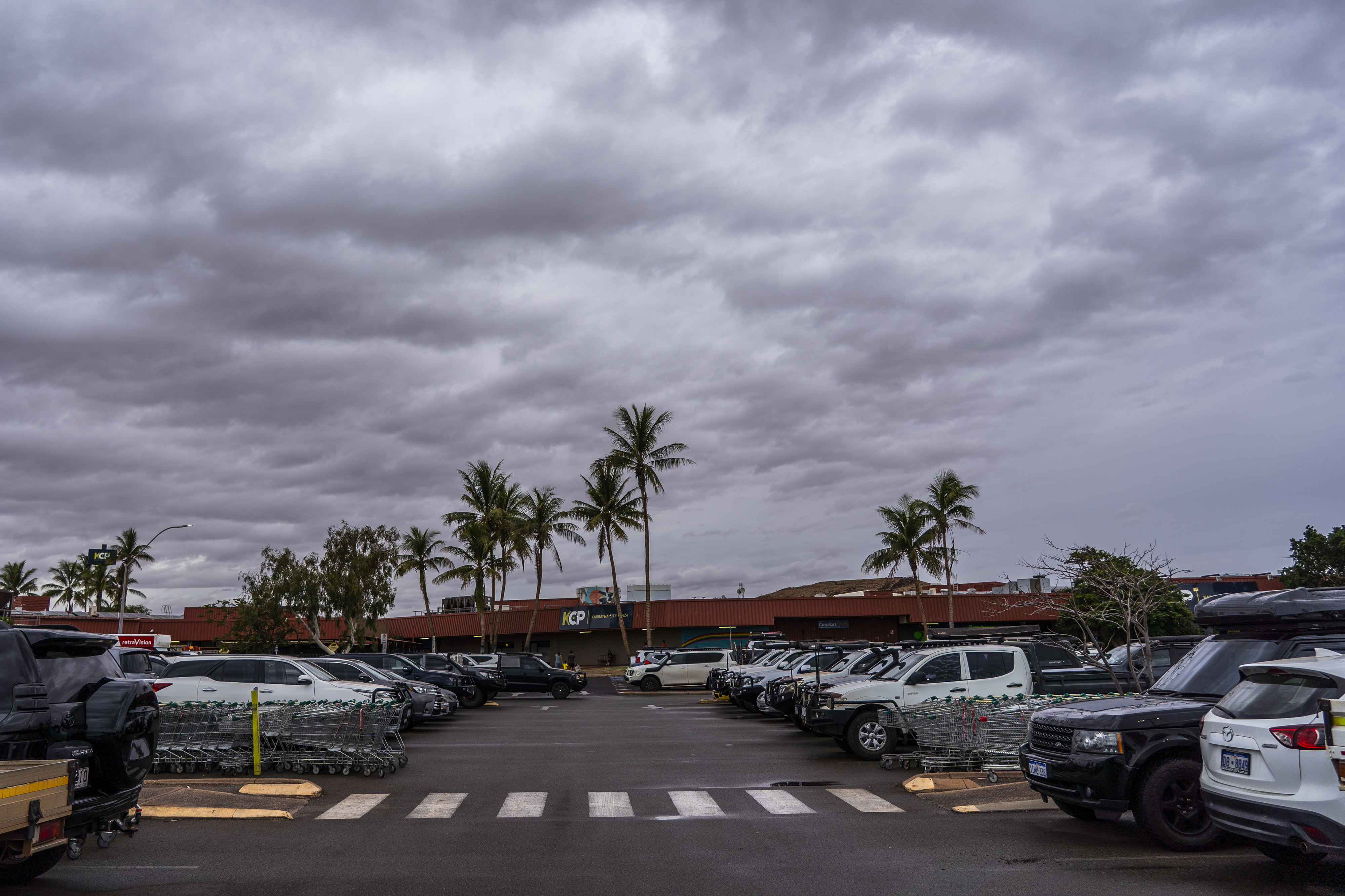 Cloudy hills and ocean ahead of cyclone impact