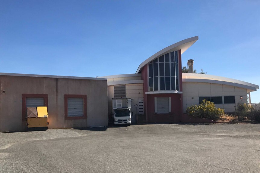 A once-abandoned aeroplane hanger in Alice Springs that now houses a pair of bakers.