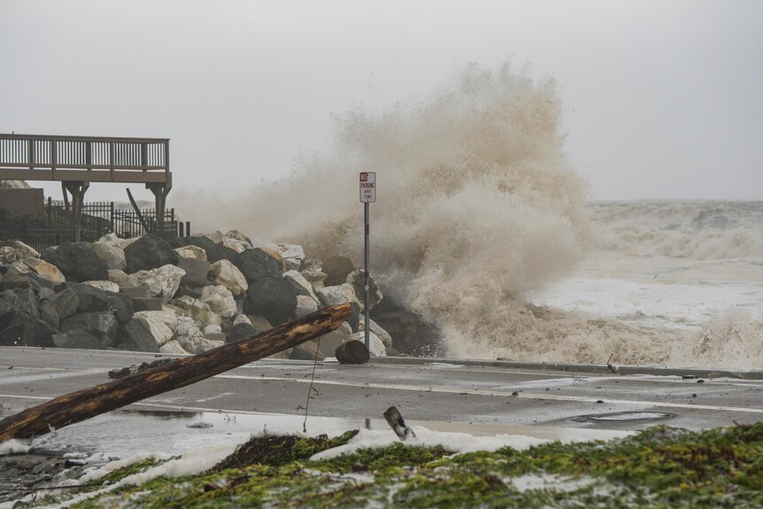 Heavy storm waves crash along rocks at Capitola in California.