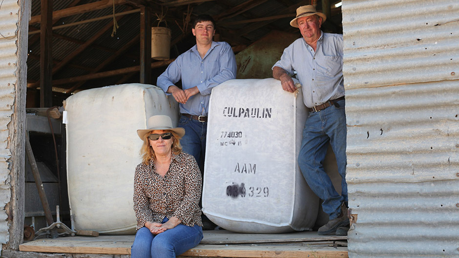 The Davies family with some of the wool at Calpaulin station, in far west New South Wales.