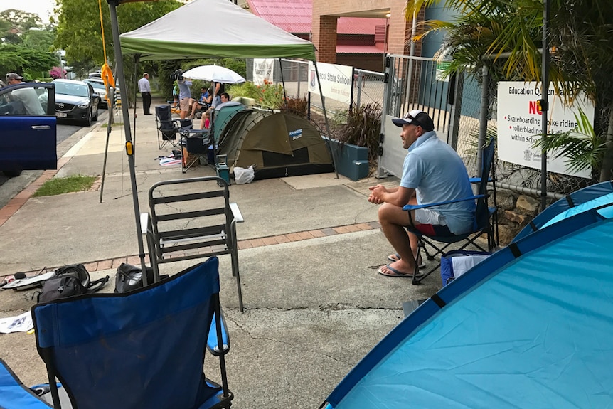 Tents and swags on a footpath outside a school in Ascot, Brisbane.