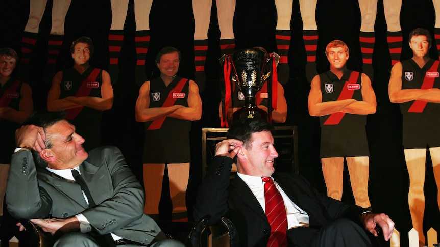 Fondly remembered .. Merv Neagle (left) pictured with former Bombers team-mate Simon Madden during a 2004 club reunion