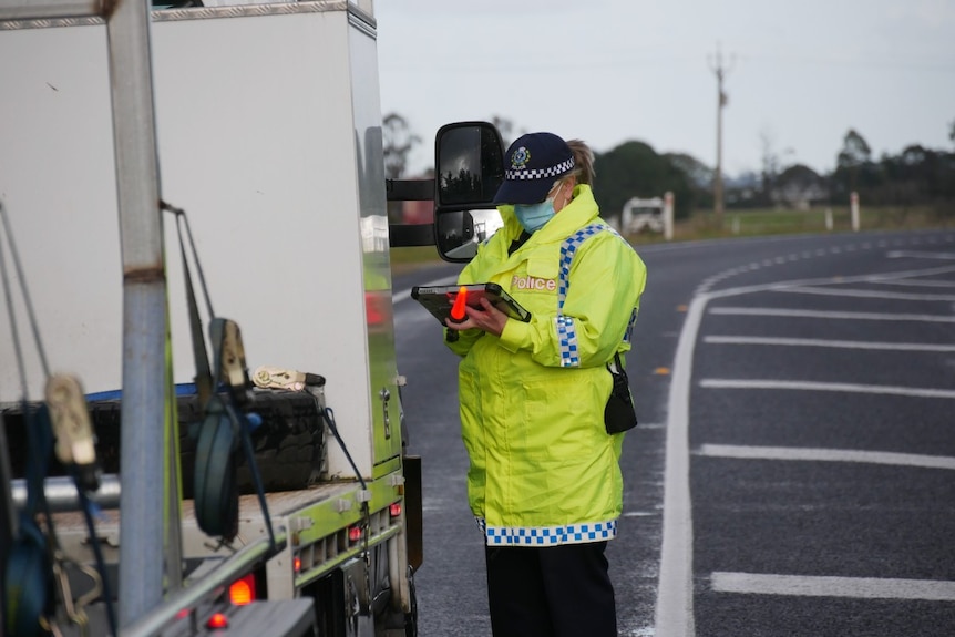 A police officer at a border checkpoint