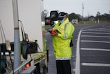 A police officer at a border checkpoint