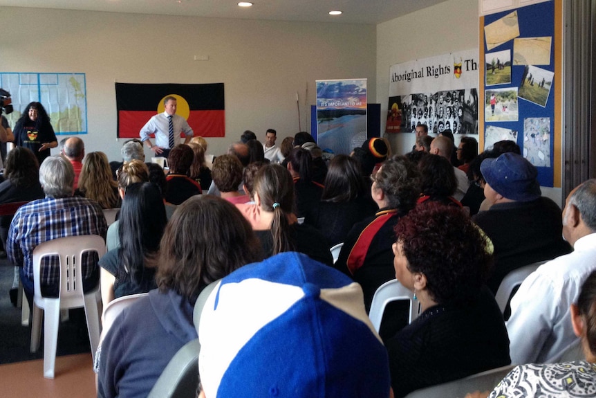 Tasmanian Premier Will Hodgman talks to members of the Aboriginal community.