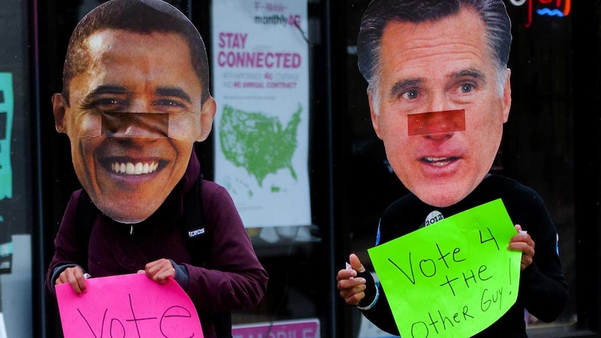 Obama supporters walk around Chicago wearing Obama Romney masks urging people to vote.