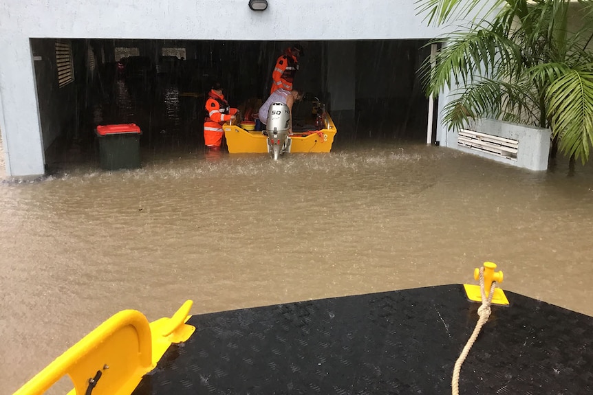 SES floodboat at a flooded house in Rosslea in Townsville in February 2019.