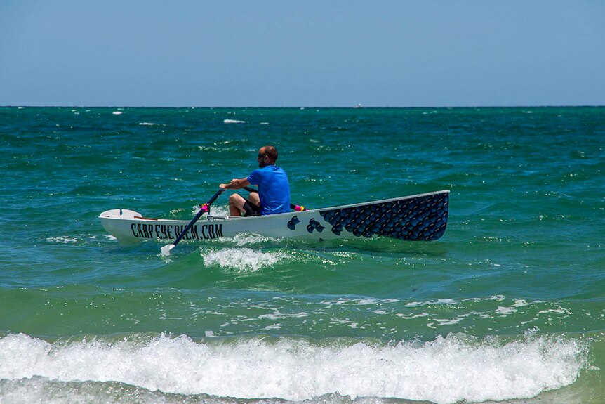 Dan O'Callaghan takes his boat for a test run at West Beach.