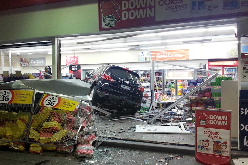 Car crashes into Shell service station.