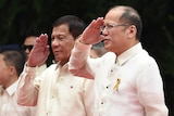 Outgoing Philippines President Benigno Aquino (R) and his successor Rodrigo Duterte (centre-L).