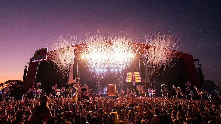 Photo of the main stage at Beyond The Valley at sunset with bright white fireworks