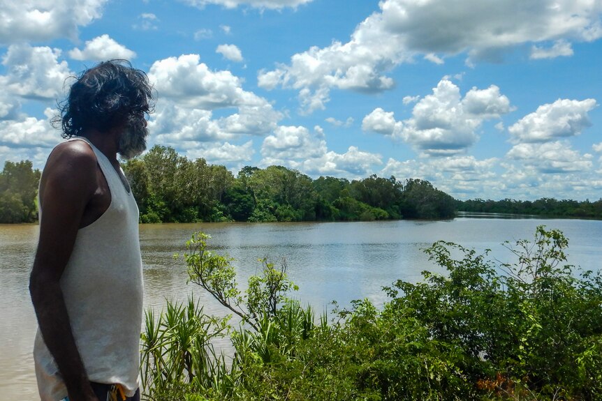 A man looks pensively at the Roper River