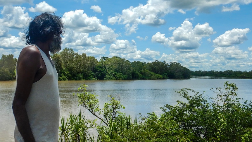 A man looks pensively at the Roper River