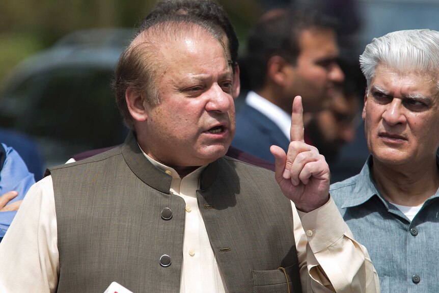 Pakistani Prime Minister Nawaz Sharif speaks to reporters outside the premises of the Joint Investigation Team.