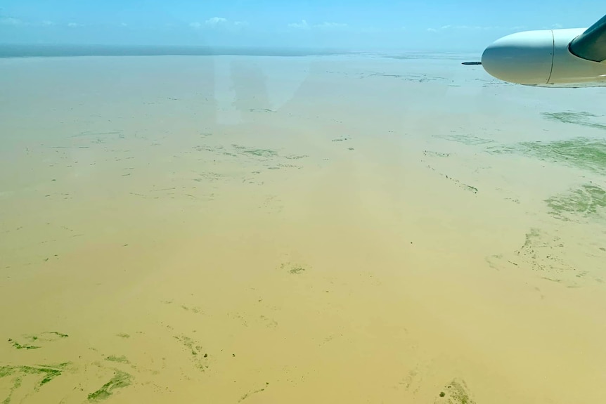 A flooded flat plain viewed from an aircraft