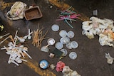 An aerial shot of different types of plastic that have been sorted.