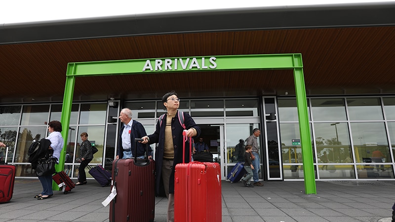 Tourists arrive at Hobart Airport