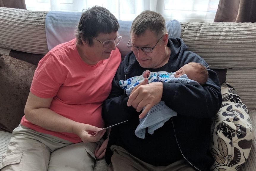 Joanne Cowan and her deceased husband John meet their grandson for the first time. 