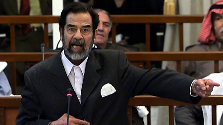 Former Iraqi president Saddam Hussein has stormed out of court (file photo).