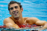 Michael Phelps of the US smiles with relief after winning his 19th career Olympic medal in London.