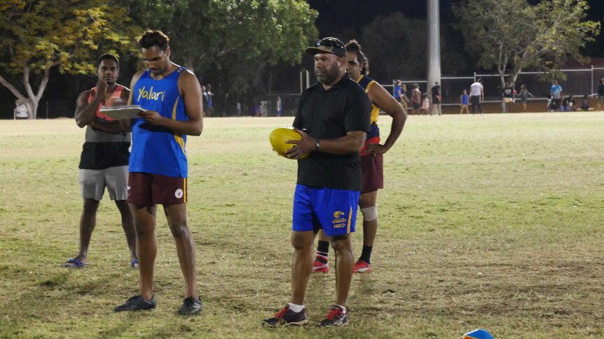 Coach Clinton Cox with the Hawks at training