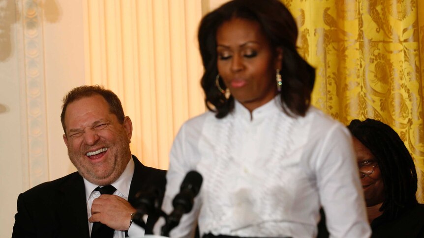 Harvey Weinstein laughs at remarks directed at him by Michelle Obama