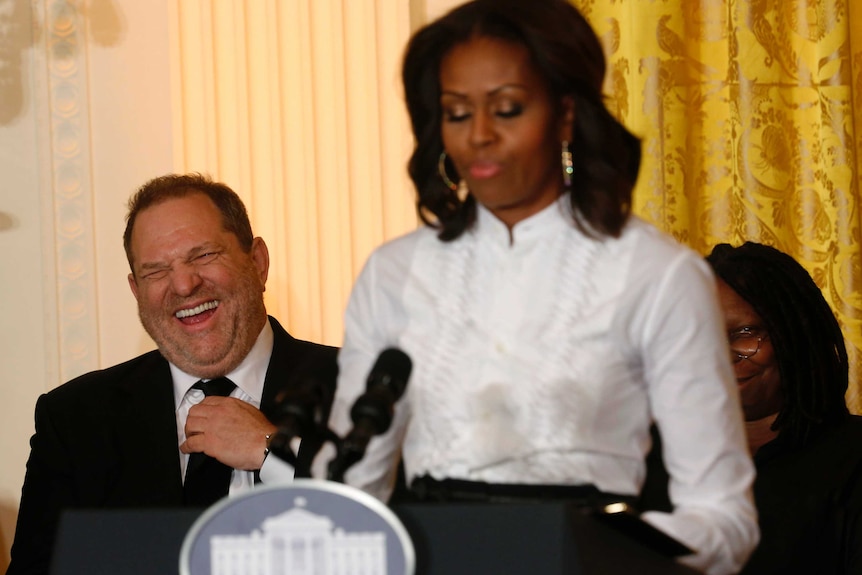 Harvey Weinstein laughs at remarks directed at him by Michelle Obama