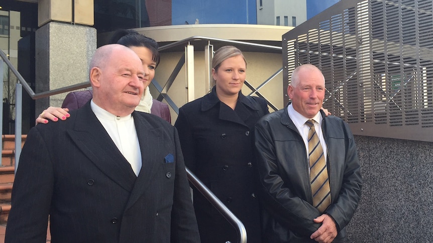 Lucille Butterworth's brothers in front of Hobart Magistrates Court