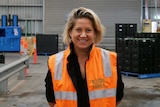 Catherine Velisha stands in the middle of a packing shed in Werribee South