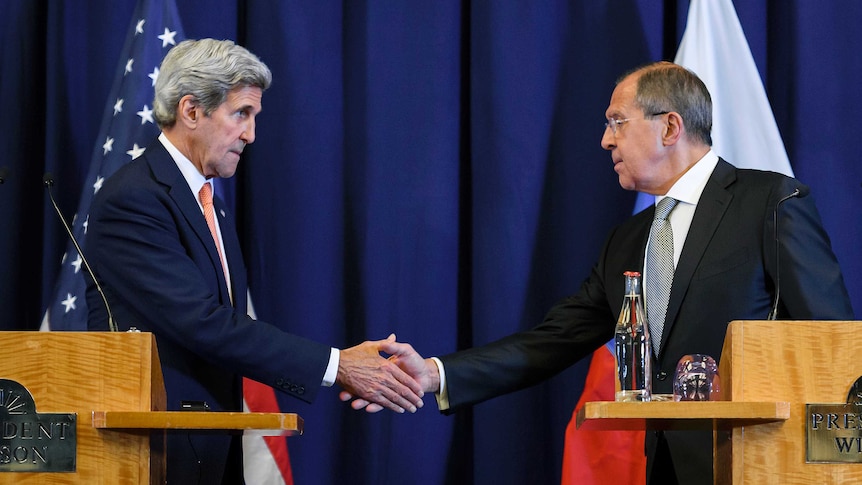John Kerry and Sergei Lavrov shake hands